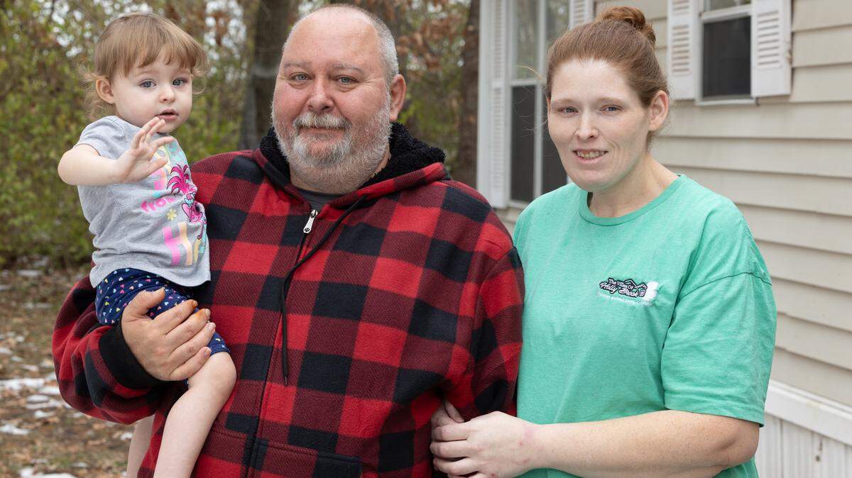 Matthew Clevenger, Michelle Ramsey and their 2-year-old daughter Gwendolyn stand in front of the mobile home they moved into in April 2025. The home has water damage they say they didn’t know about before signing a rent-to-own agreement. Now the owner is ending all rental leases. They were given the choice of either purchasing the home or moving out, but they say they can’t afford what’s left of the purchase price. “I have a young child and another on the way,” Ramsey said. “This is just too much stress on top of it all.”