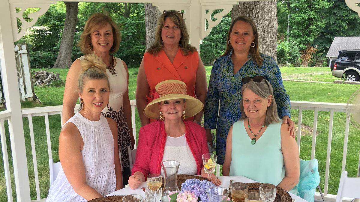 Kathy Kaiser, top row center, is shown with Belleville Mayor Patty Gregory, bottom row center, and others in 2021 at a luncheon for St. Clair County Historical Society. Kaiser is leaving her job as PR and communications for the city after more than two years.