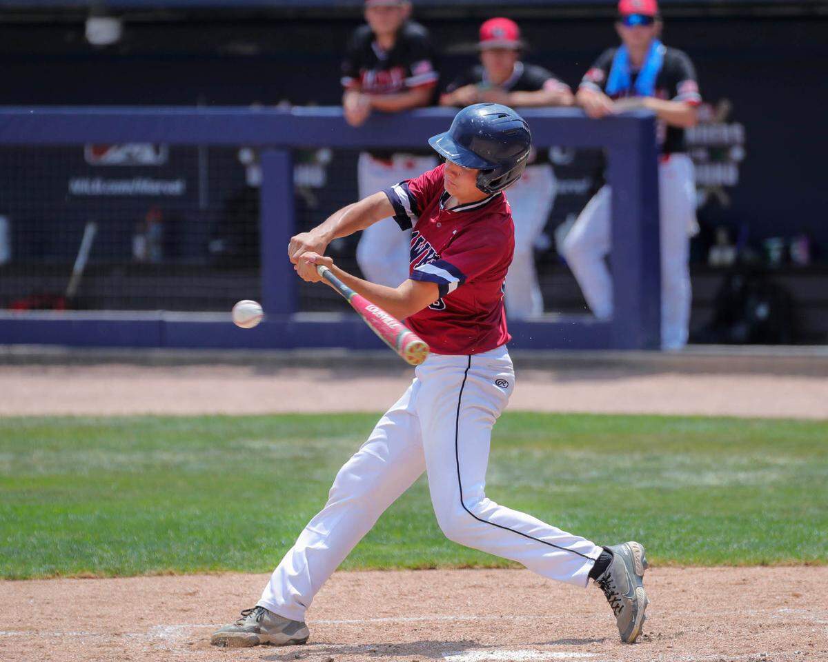 Gibault’s Brady Biffar triples down the right field line during Saturday’s IHSA Class 1A state championship game against Henry H-Senachwine at Dozer Park in Peoria. Gibault went on to an 8-0 win to secure the state crown.
