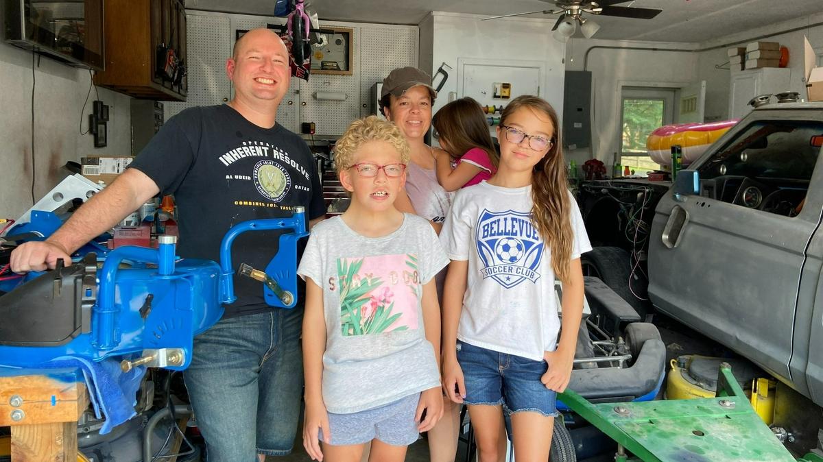 The Sabo family: Matthew, Rachel, Jessica, and, front, Andi and Charly. Through Matthew’s innovative inventions — custom radio-controlled lawn mowers — he is raising funds to further research on Chromosome 18p, a rare genetic condition affecting Andi, who is 10.