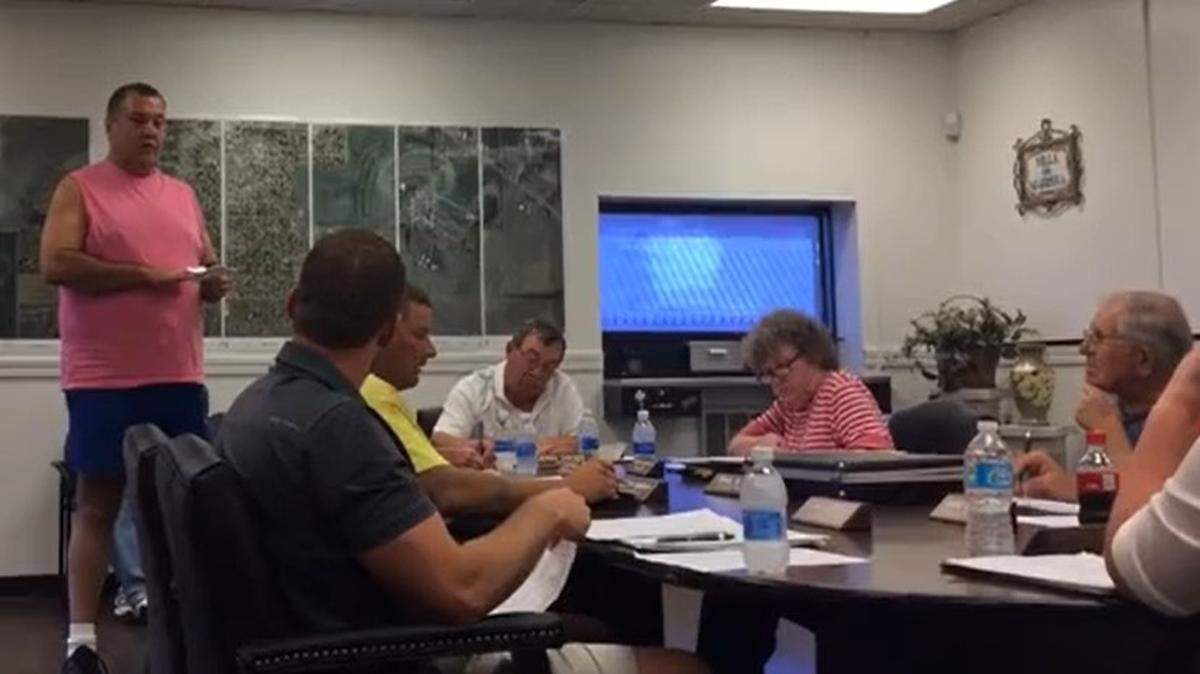 Local activist Gene Triefenbach protests water and sewer rate hikes at a Marissa Village Board meeting in 2017, when he still lived in the village. He later moved to New Athens.