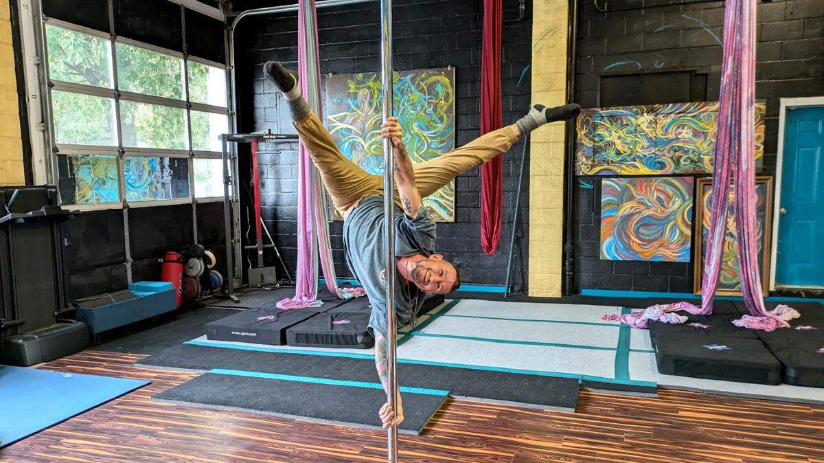 Brian Lynch, owner of Valkyrie Aerial Arts, is a professional dancer who specializes in pole performing arts.