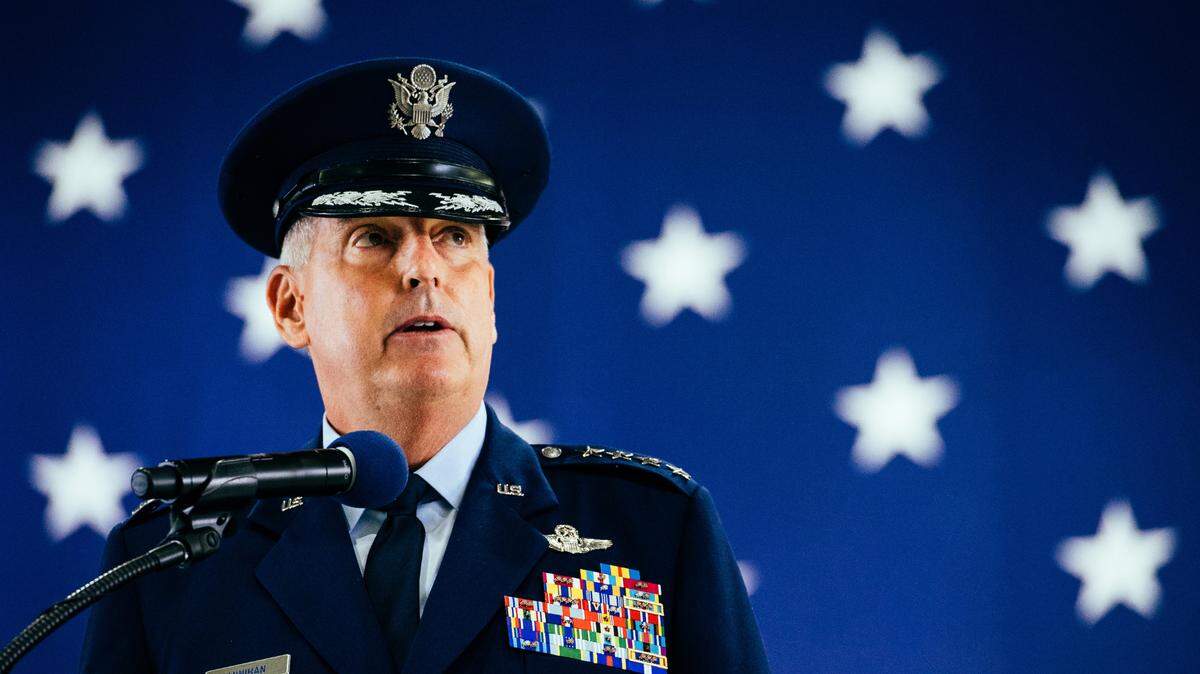 U.S. Air Force Gen. Mike Minihan, incoming Air Mobility Command commander, gives a speech at Scott Air Force Base in 2021.