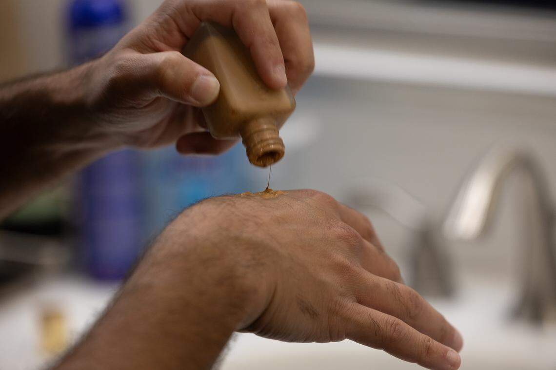 Elvis tribute actors often have to use extensive cosmetics to pull off their Elvis looks, including foundation, eyeliner and a good supply of sturdy hair spray.