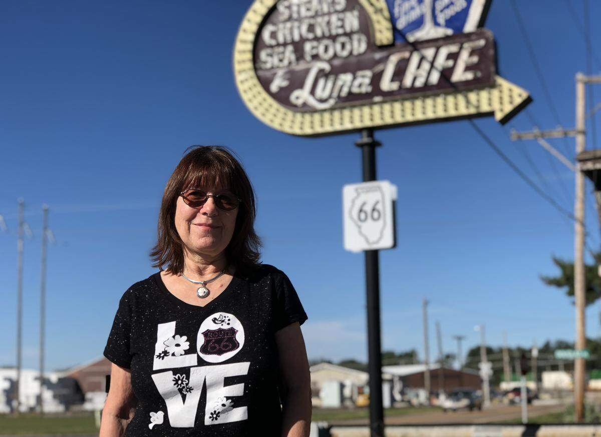 Route 66 historian Cheryl Eichar Jett poses in front of Luna Café in Mitchell, Illinois. The café sits along the historic Route 66 and is said to have been frequented by Al Capone.