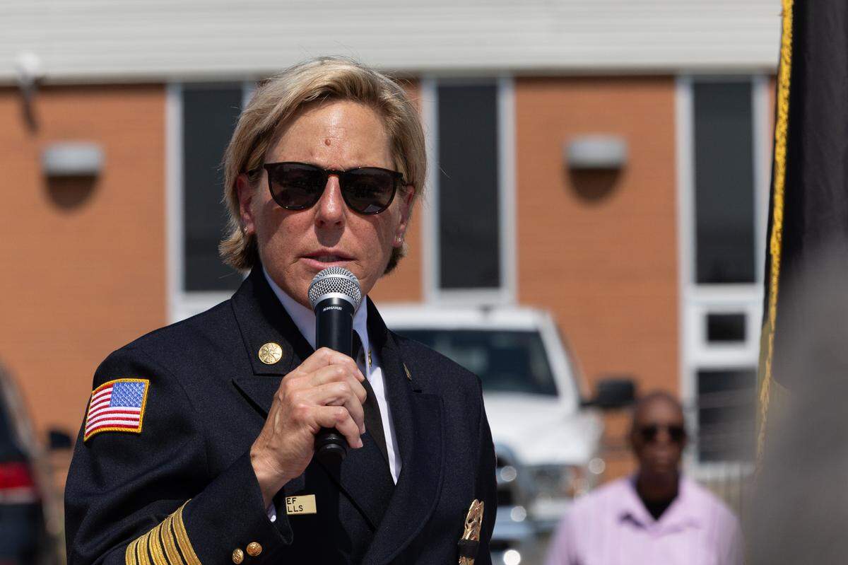 Belleville fire chief Stephanie Mills speaks during a 9/11 remembrance ceremony along the 9/11 Memorial Walkway at Belleville firehouse #4.