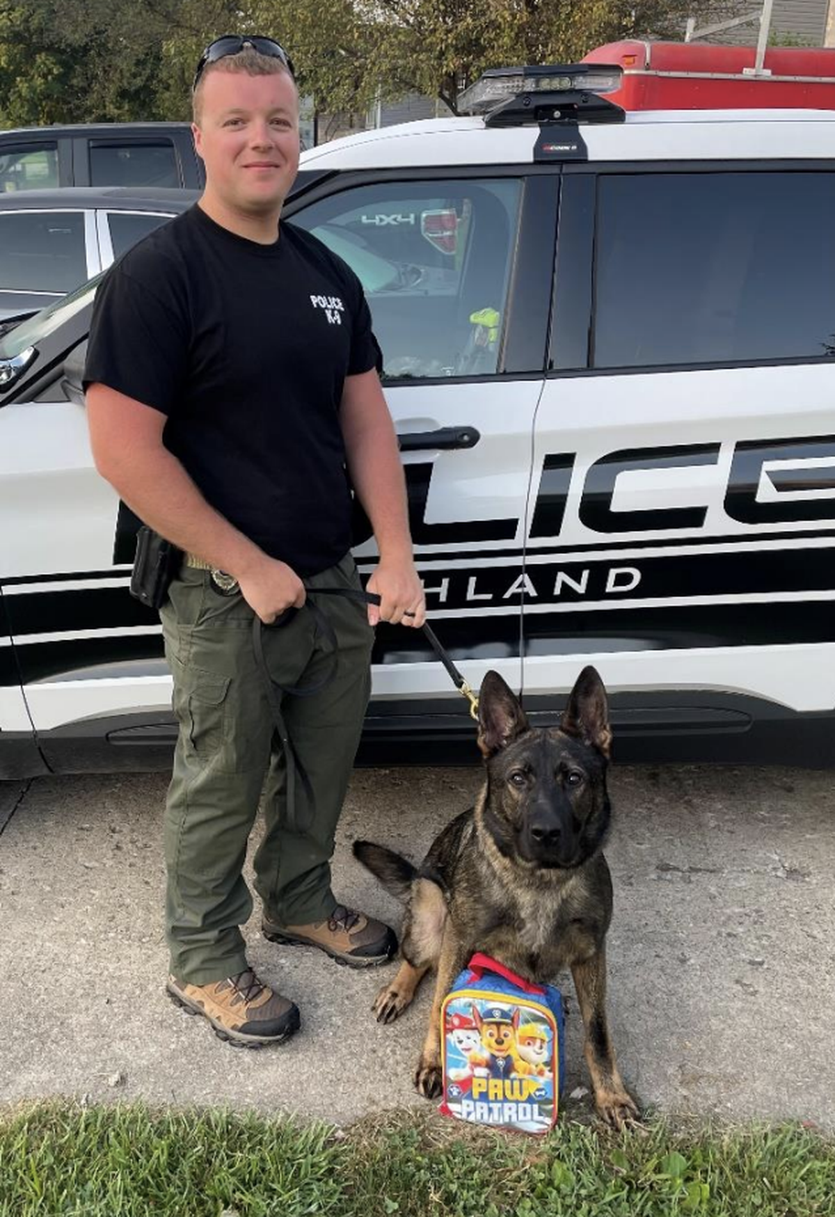 Pictured is Highland Police Officer Brad Sutton with Hondo, Highland’s 2-year-old German shepherd K-9 officer. Partnered with Sutton, Hondo is trained in narcotics detection, tracking and searches, and suspect apprehension, among other tasks.