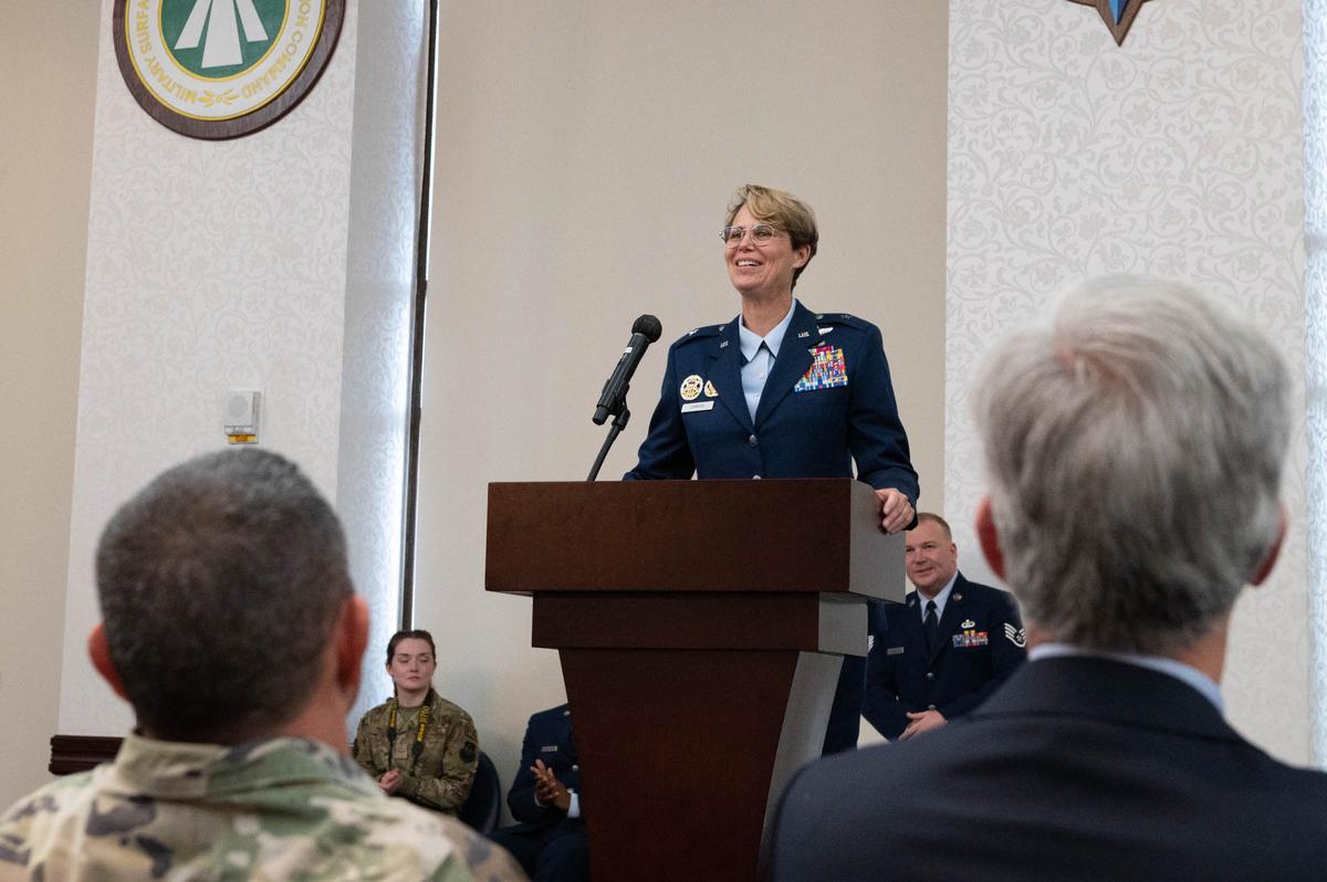 U.S. Air Force Brig. Gen. Rebecca Sonkiss, 618th Air Operations Center commander, addresses the crowd after assuming command of the 618th AOC on Scott Air Force Base. Sonkiss previously served as the Deputy Director for Counter Threats and International Cooperation on the Joint Staff, Washington, D.C.