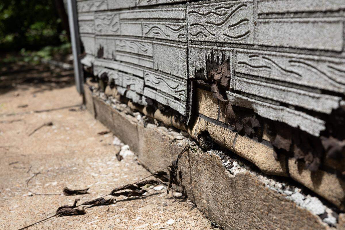 Pieces of the stone foundation are falling off a condemned property at 217 N. Jackson St. in Belleville.