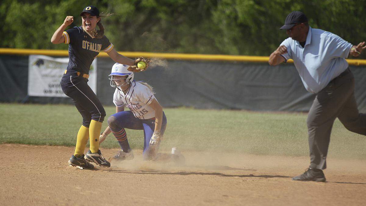 O'Fallon shortstop Miley Brunner celebrates after Nashville's Mackenzie McFeron is thrown out stealing.