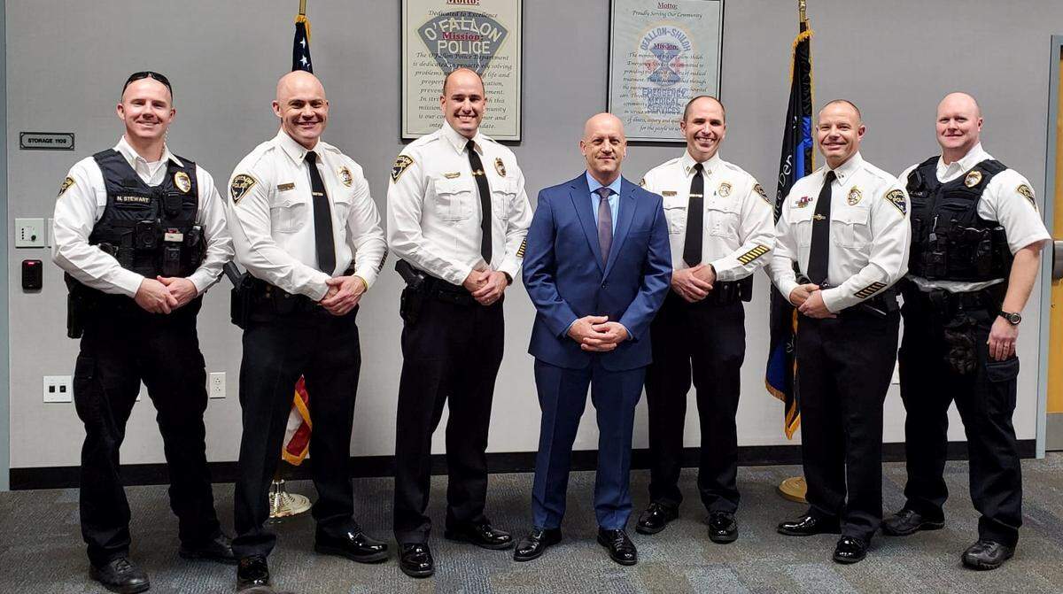 Officer Dan Hesselbacher, who previously worked for the department for five years, has returned to the police force. From left, Lt. Nick Stewart, Capt. Dave Matevey, Police Chief Kirk Brueggemann, Hesselbacher, Lt. Patrick Feldhake, Capt. Mike Mojzis and Officer Eric Buck.