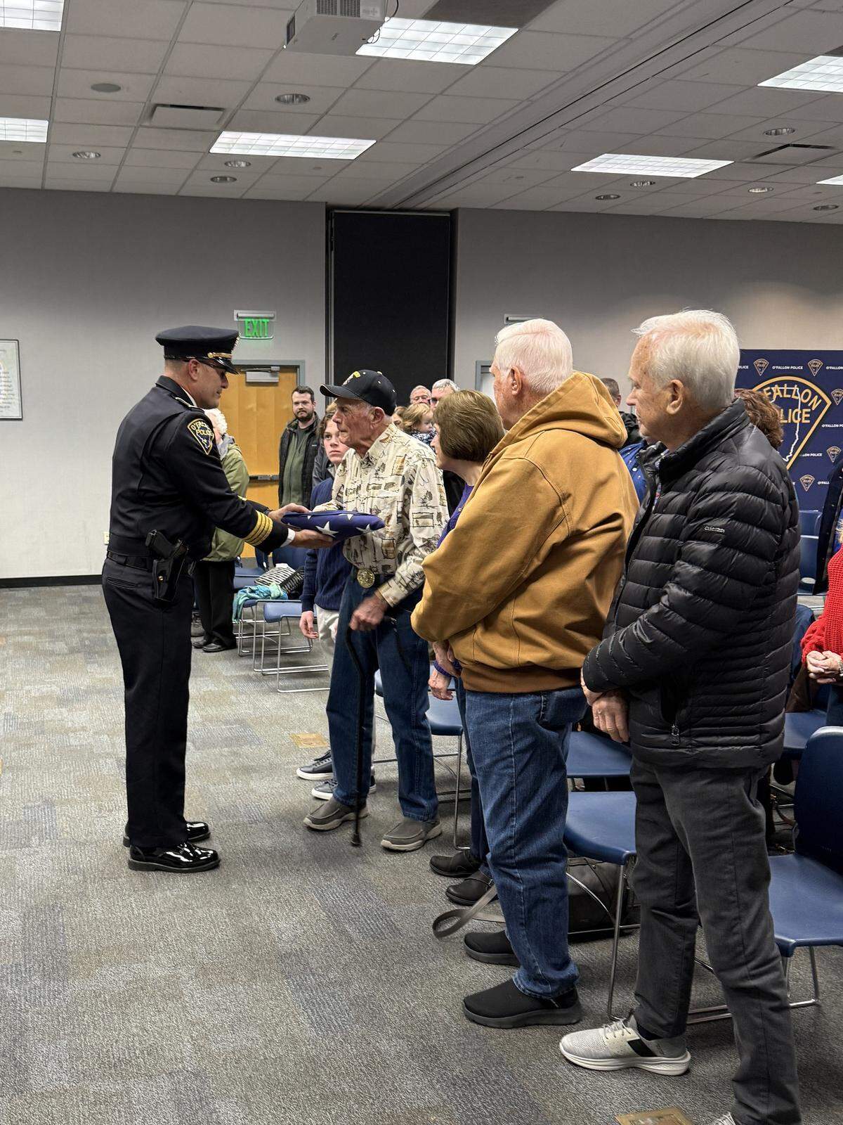 The Police Color Guard presents the flag to Gerald Schmitt, BB’s oldest surviving grandson.