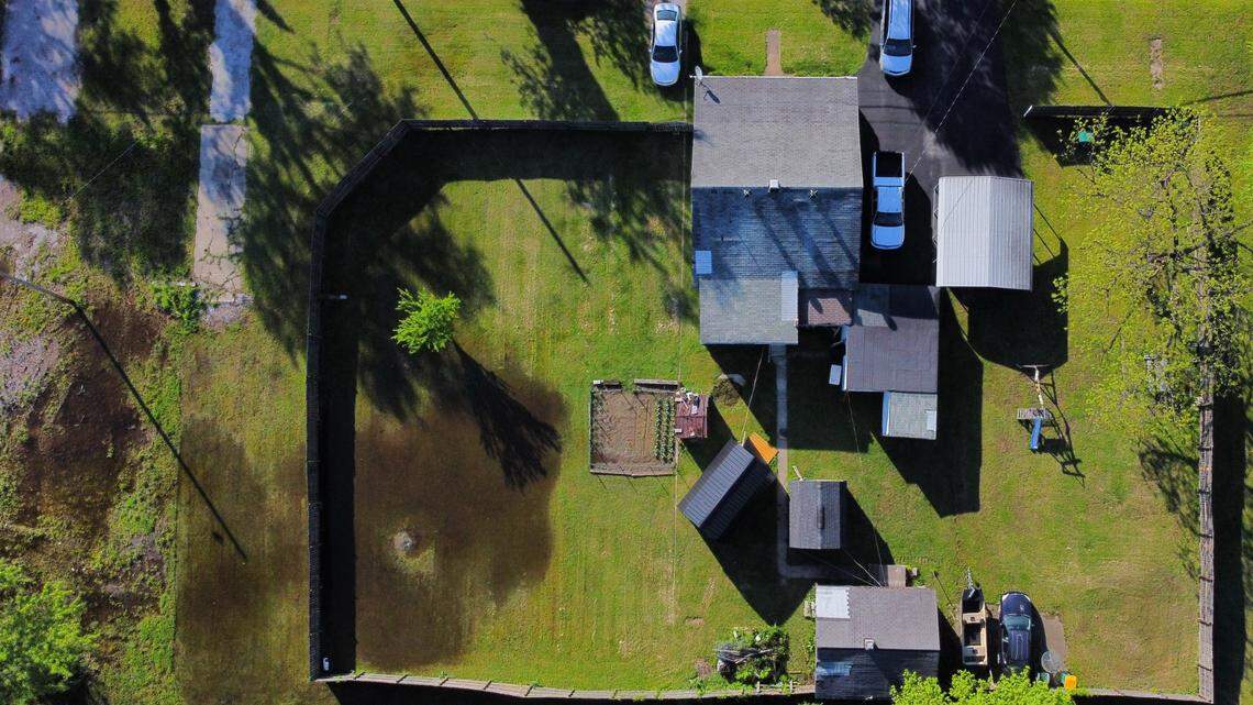 Sewage-contaminated water floods a Cahokia Heights resident’s property on May 1, 2024, after rain caused a sewage pump station to overflow over three days prior.