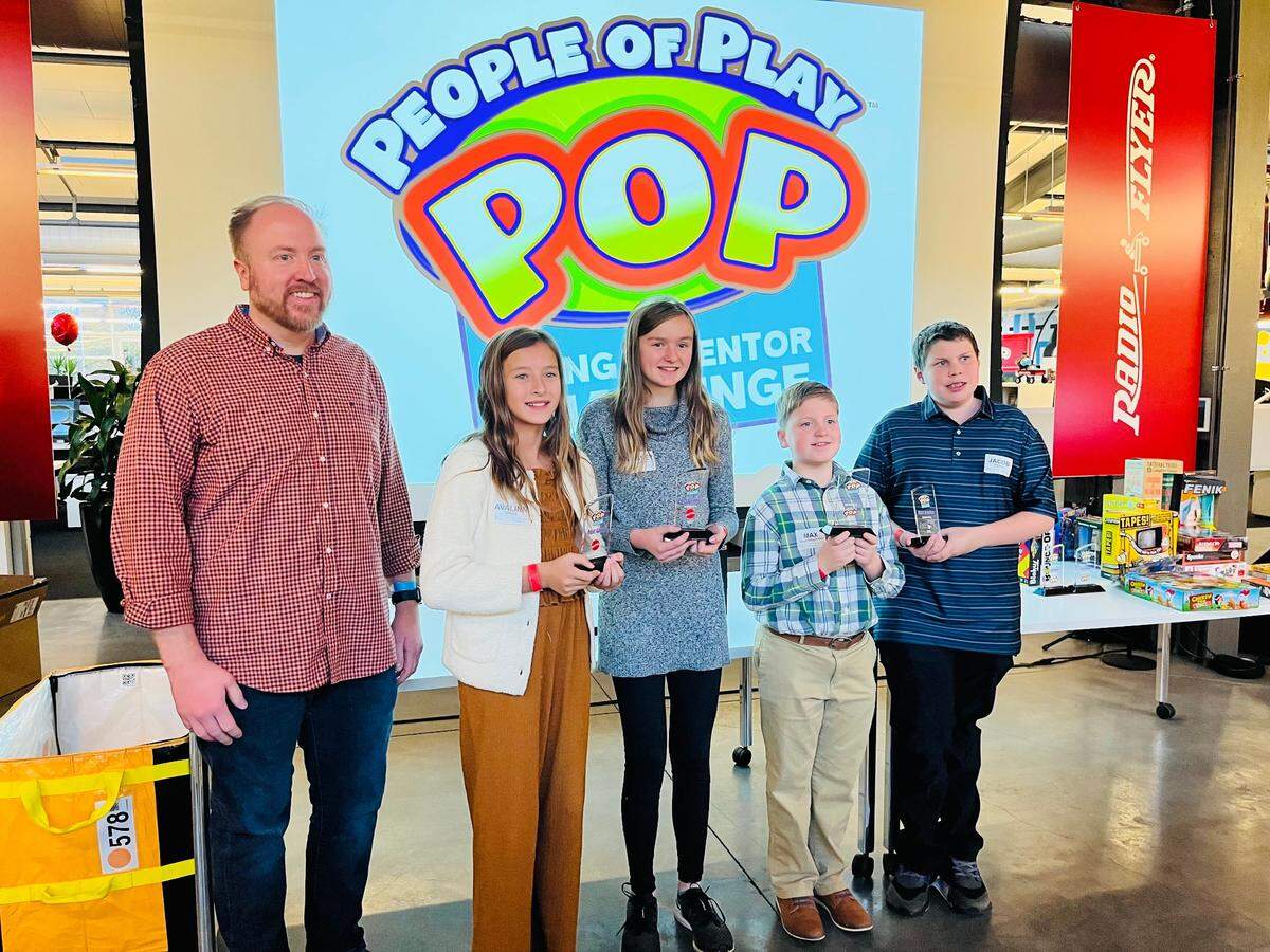 In their first year as an organization, members of the Innovators Club at St. Clare School in O’Fallon were among the top place finishers at the People of Play’s 17th Annual Young Inventor Challenge at Radio Flyer Headquarters in Chicago last month. Pictured are the winners: Avalinn Olson and Ainsley Turkington with “Chicken Scratch”; Jacob Portera with Water Bottle Maze (not there, Grant Middleton); and Henry Gramelspacher with Rock Paper Scissors Brawl.
