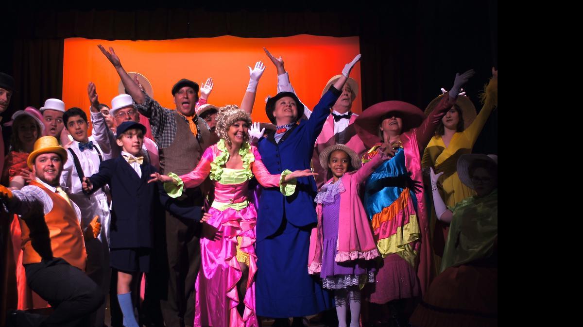 
Robbin Netemeyer, center, who plays Mrs. Corry, sings “Supercalifragilisticexpialidocious” with the cast.
