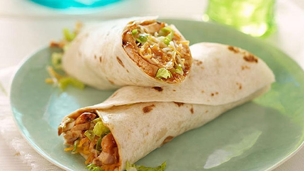 These grilled chicken wraps are spiced up with barbecue sauce.