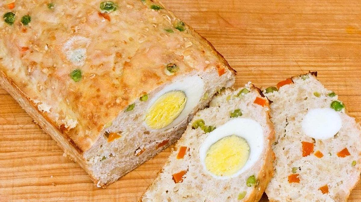 Woof-Woof Pooch Pie is basically an unseasoned meatloaf with hard-boiled eggs hidden inside.