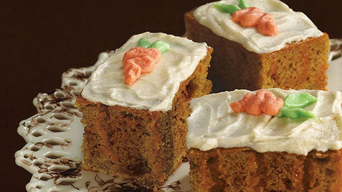 Orange gelatin is the secret ingredient to this Carrot Poke Cake.