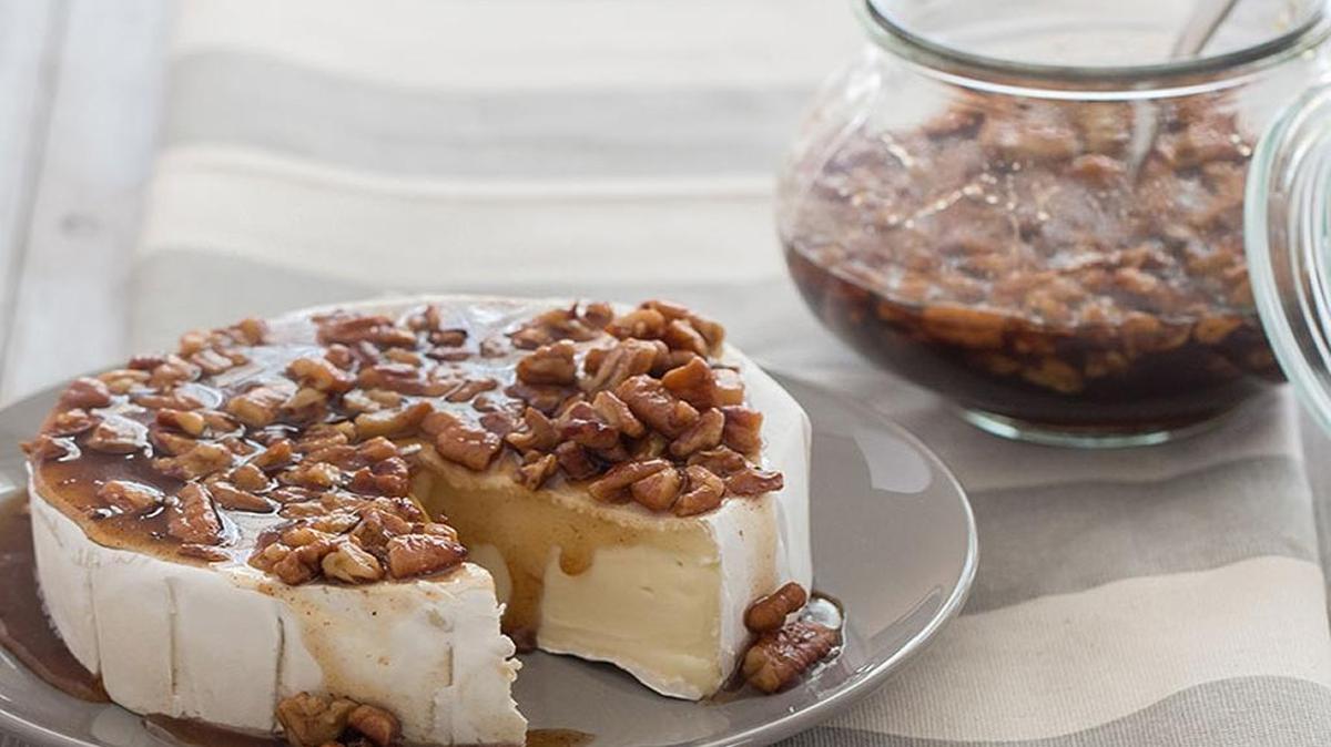 Cinnamon Pecan Pie Topping can be poured over brie for an interesting appetizer.