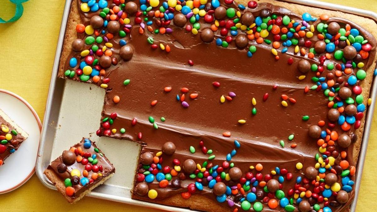 Sheet cakes are just right for parties and feeding a crowd because they are made in a bigger, though shallower, pan. Add some sprinkles and candies for a birthday topping.