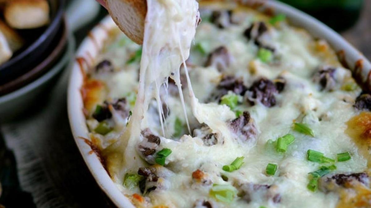 Try a different appetizer this year, Cheesesteak Dip.