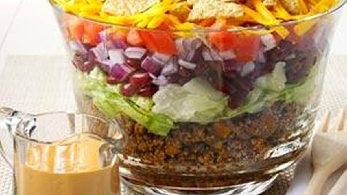 Potluck Taco Salad will be welcome wherever you take it.