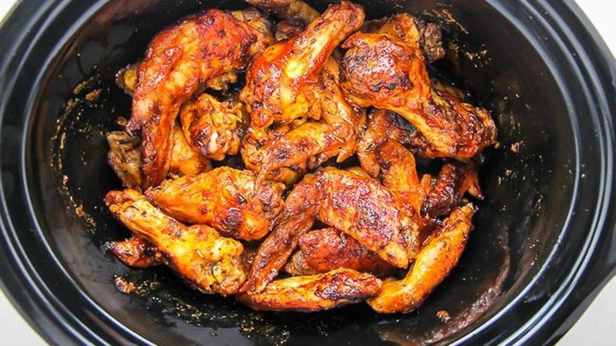 These wings spend just an hour on high in the slow cooker, along with some buffalo sauce.