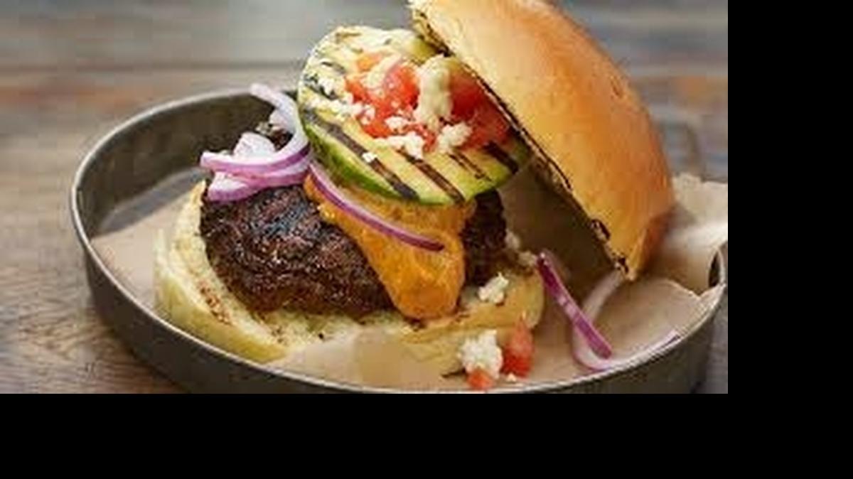 
Shame on plain burgers. Dress them up with add-ons like grilled avocado slices.
