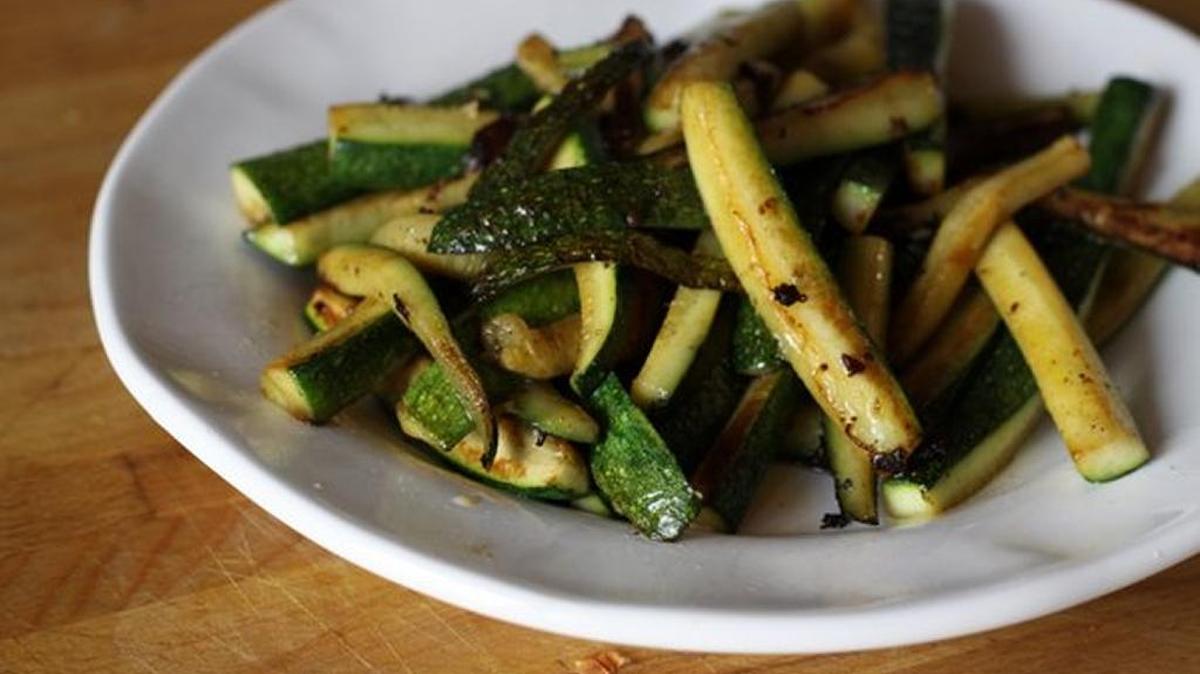 
Zucchini spears are sauteed in olive oil flavored with garlic and red peppers.
