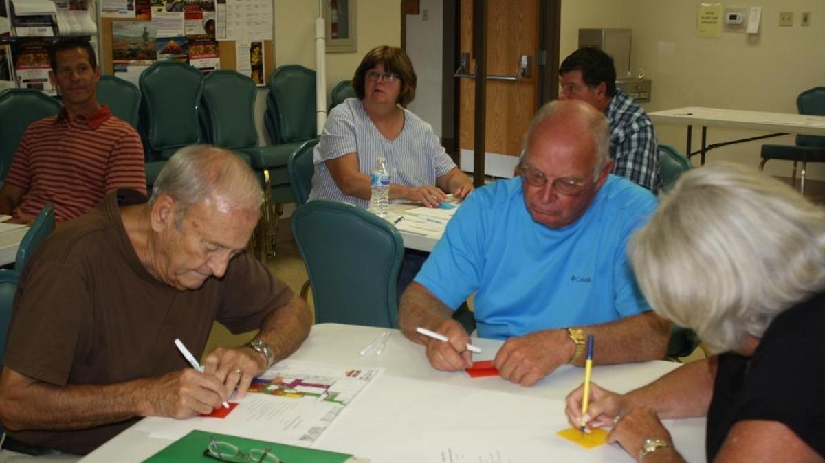 From left, Bill Musser, Dale Biver and Mary Martychenko filled out surveys during the 2017 Shiloh Visioning Workshop hosted by Heartlands Conservancy, aimed at garnering community input for a new comprehensive plan for the village.