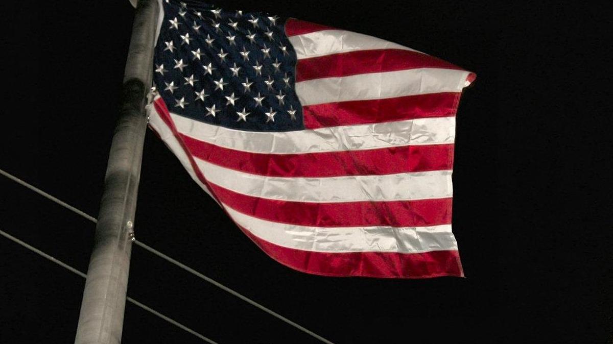 If you’re going to fly the flag at night, make sure you illuminate it properly.
