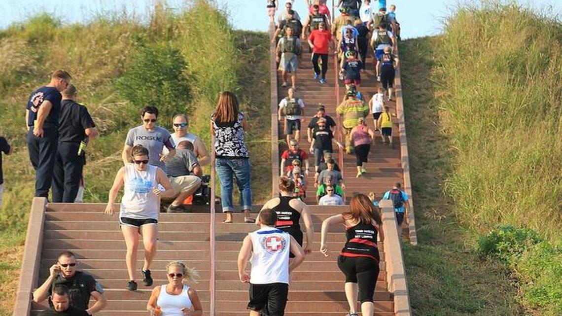 Runners make their way up and down the 103 steps of Monks Mound at the Cahokia Mounds State Historic Site in Collinsville in 2013.
