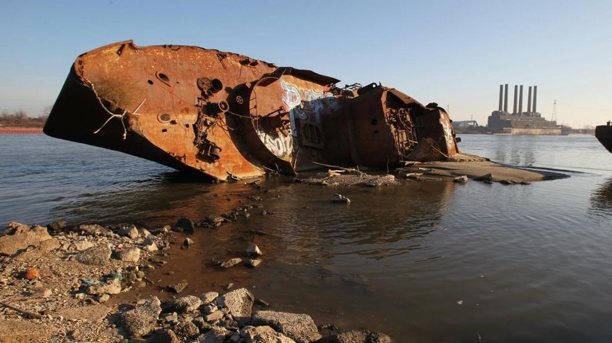 During low water levels, the former riverfront museum ship the USS Inaugural can be seen at its resting place downstream of the Poplar street bridge. The 184-foot-long former Navy minesweeper was ripped from its mooring during the flood of 1993.