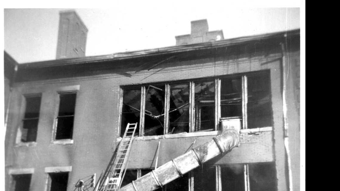 
Residents check out the damage to Henry Raab School after the fire in 1960.
