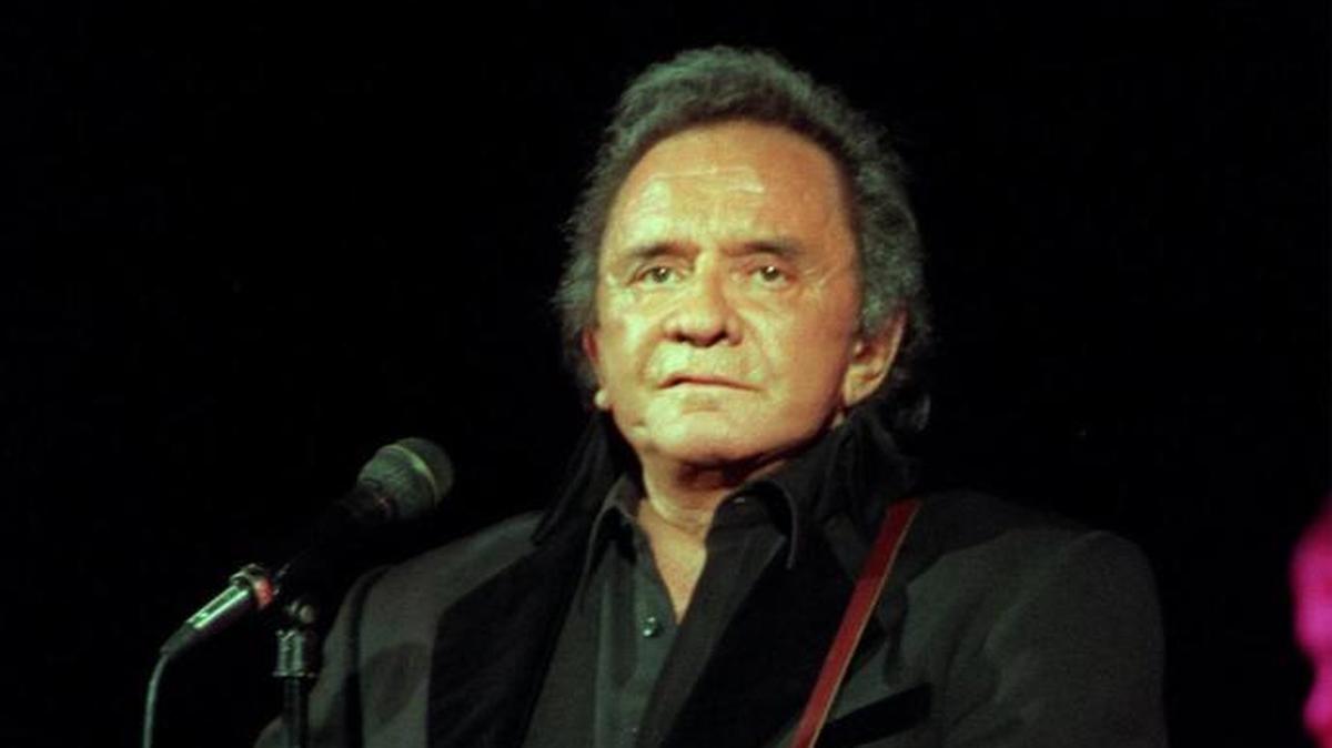 Johnny Cash in a file photo performing on March 15, 1997 at the Majestic Theatre in downtown Dallas, Texas.