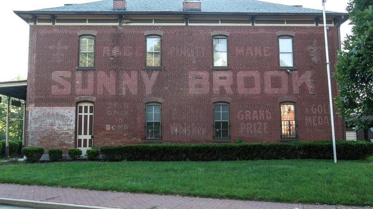 The faded Sunnybrook sign on the side of the Belleville Exchange Club.