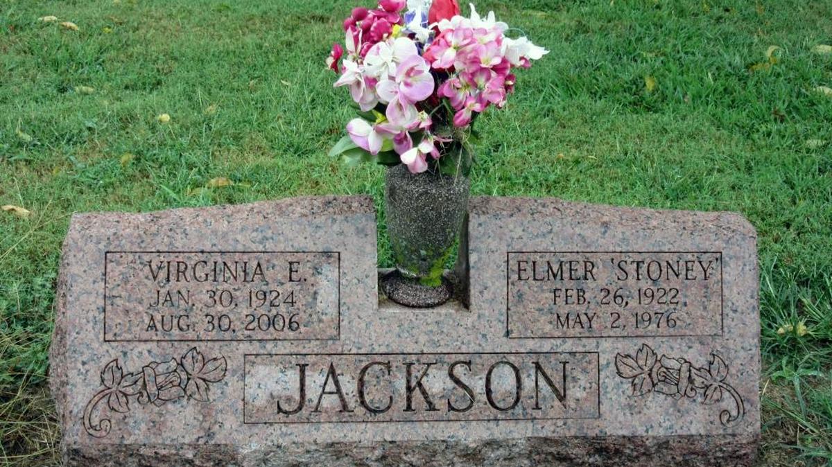 
The gravesite of Elmer “Stonewall/Stoney” Jackson and his wife, Virginia. Jackson won two state wrestling championships at Belleville Township in 1939 and ’40, and played college and professional fooball. The father of three ran Jackson’s Tavern in Belleville. He died in 1976.

