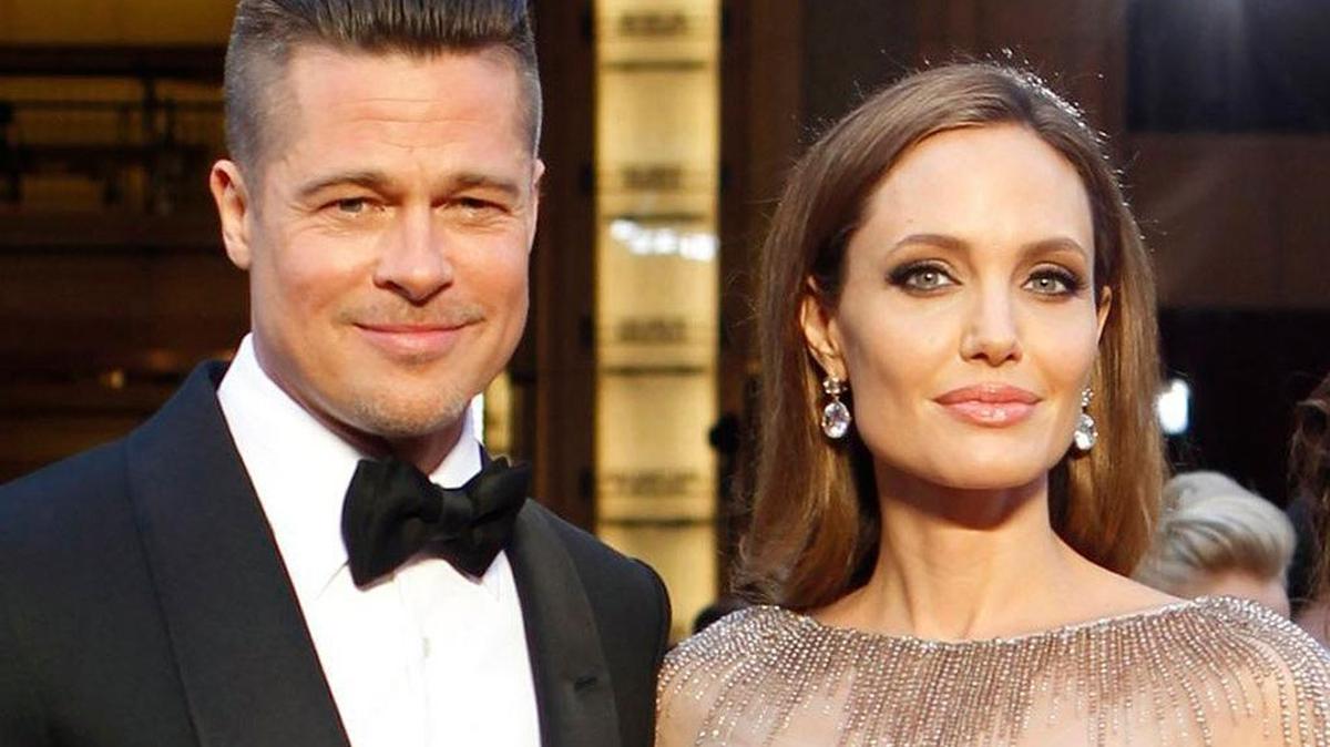 Angelina Jolie and Brad Pitt arrive at the Academy Awards in 2014.