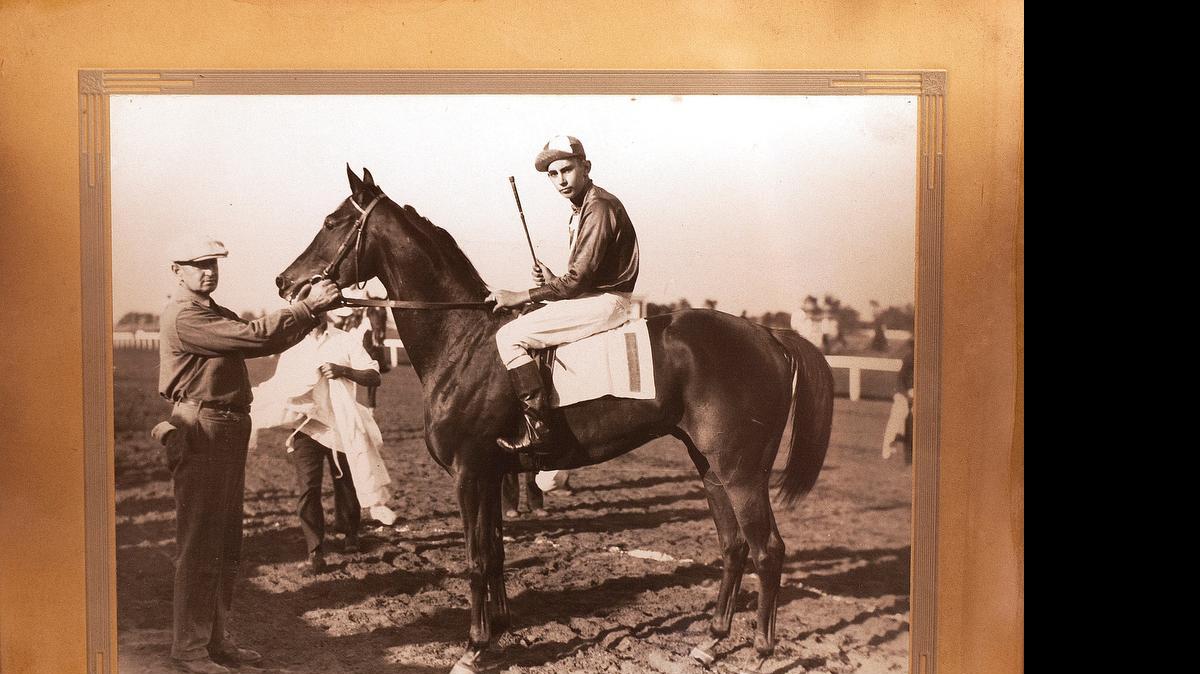 
My Dandy, owned by William and Elmer Reichert, of Freeburg, with trainer Jack Carter and jockey D. Smith at Lincoln Fields in 1928.
