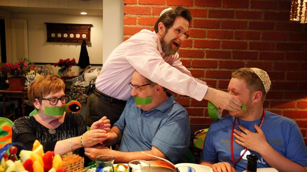 A Jewish family re-enacts the oppression that the Jewish slaves felt under Egyptian rule for a Passover Seder feast.