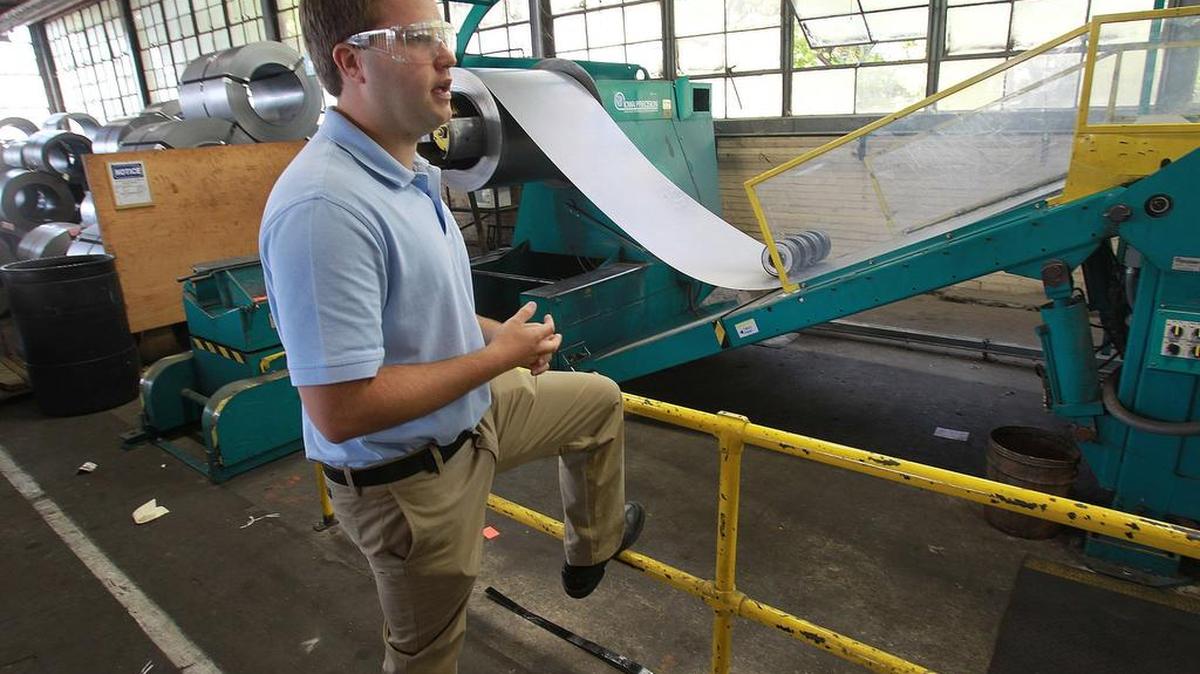 Nick Bauer, of Empire Comfort Systems, tells about this shear machine, which cuts huge rolls of sheet metal to length for manufacturing gas stoves.