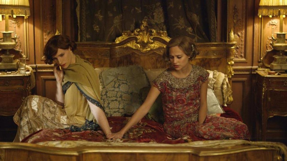 Eddie Redmayne, left, and Alicia Vikander in a scene from “The Danish Girl.”
