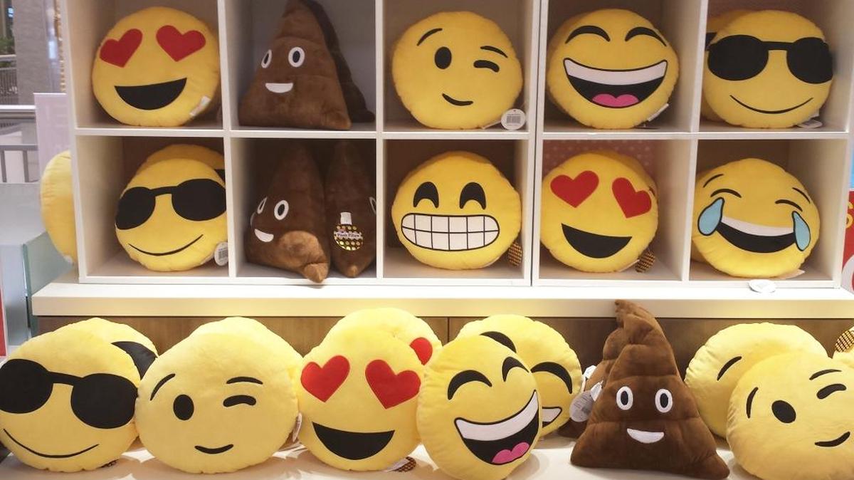 Among the holiday kiosks at St. Clair Square is this one that sells smiley pillows.