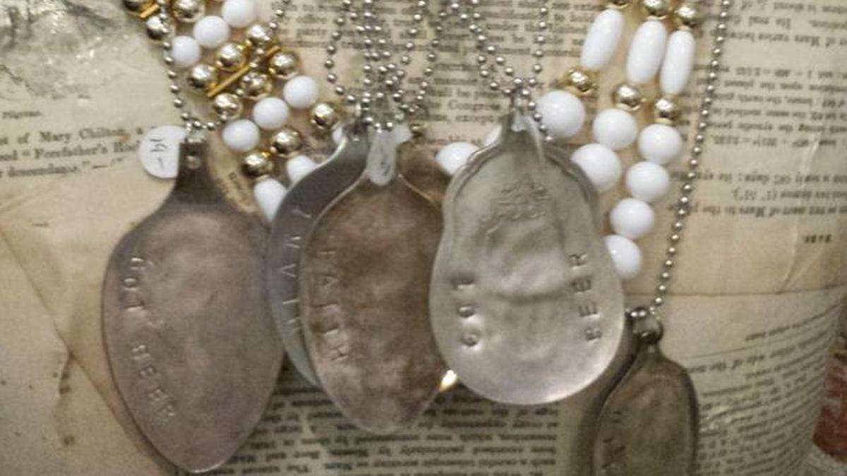 Hammered vintage silverware become pendants (with chain) at Pairabelles in Belleville and Lebanon.