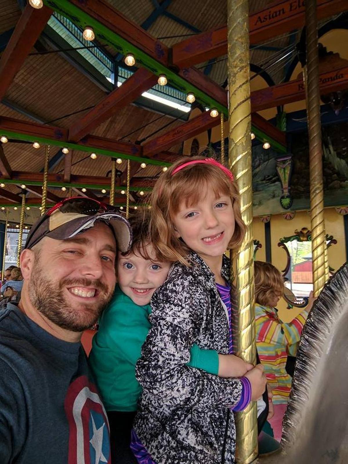 Fitness instructor David Link with his daughters, Audrey and Natalie.