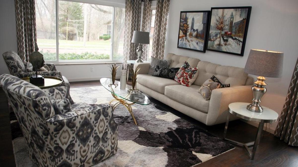 Kelly Arnold helped Bruce and Sue Kohn renovate and stage this West End mid-century home on a corner lot. She mixes patterns and styles in her designs.