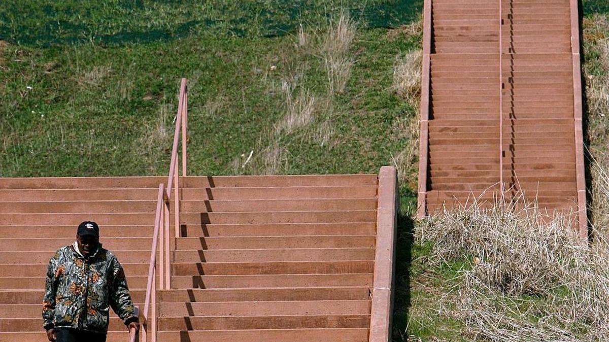 A visitor makes his way down the steps at Monks Mound at the Cahokia Mounds State Historic Site in Collinsville.