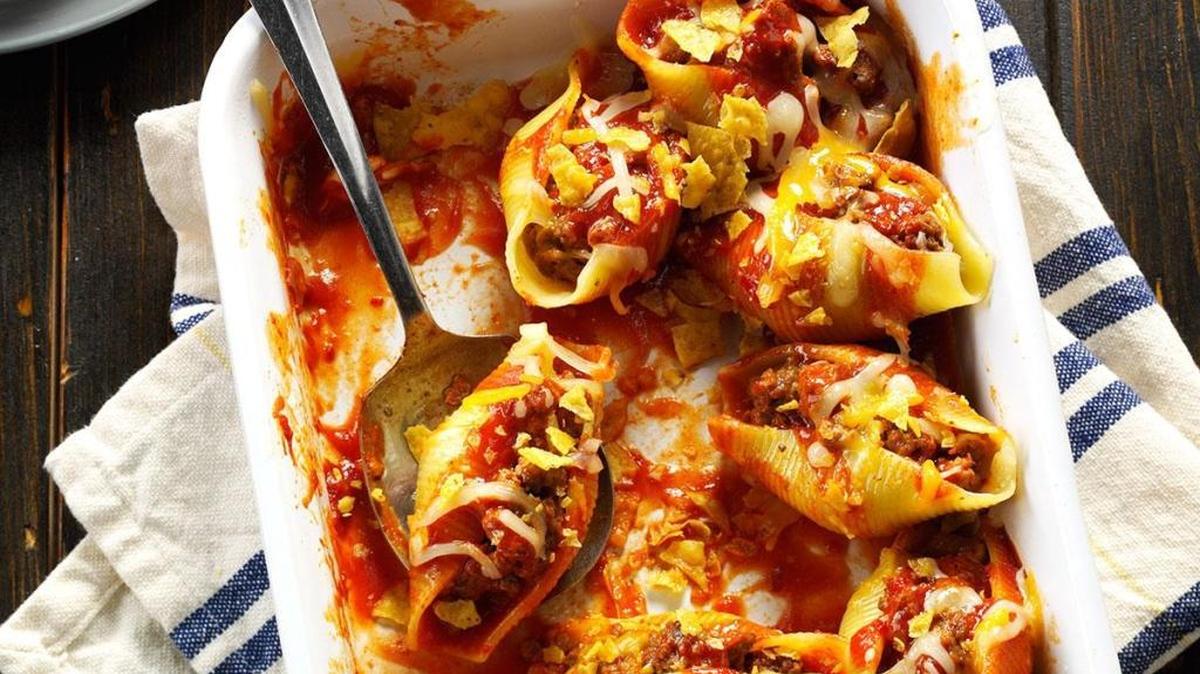 Taco Stuffed Pasta Shells have a filling that combines ground beef with taco sauce, cream cheese and other ingredients.