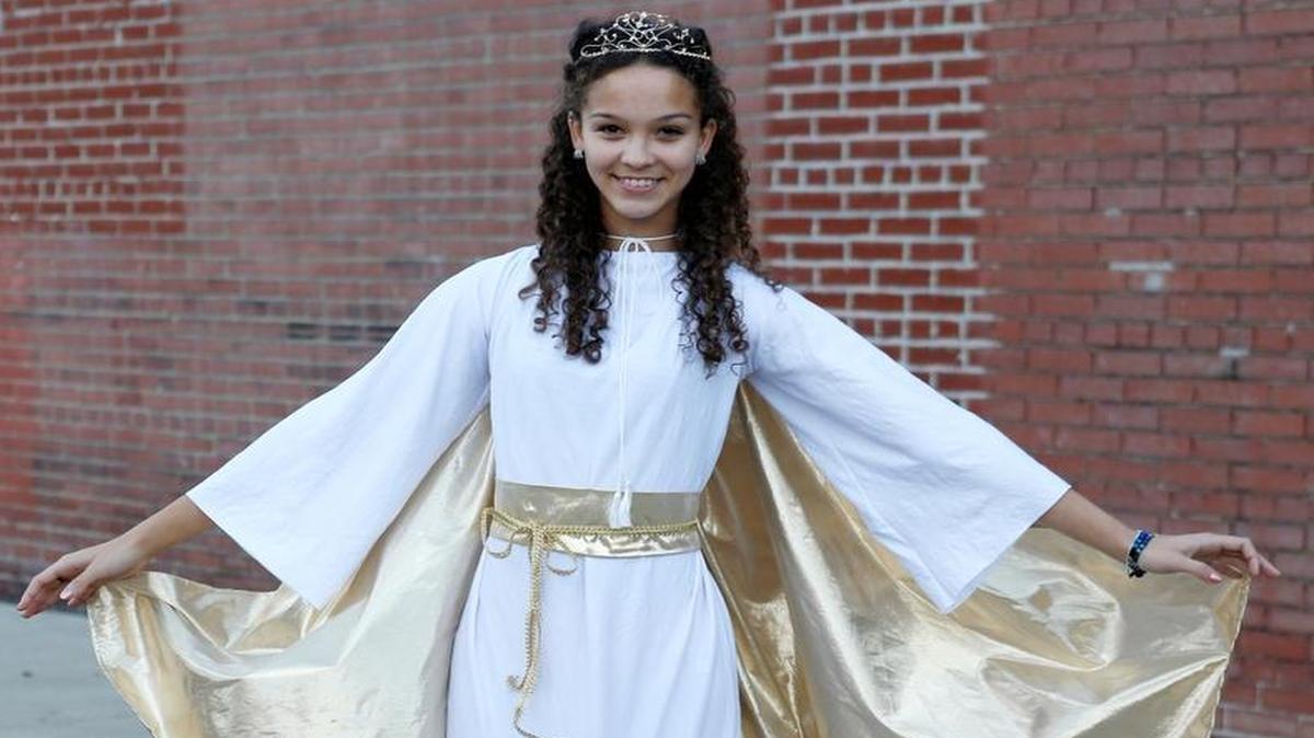 Nicole Ojukwu Jackson will open the Christkindlmarkt on Friday in downtown Belleville. She wears the tradition Christkind costume and will welcome visitors and pass out sweets to children.