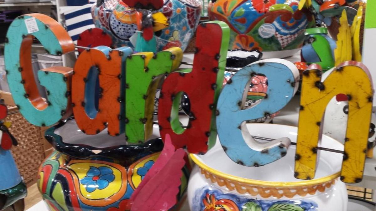 Add extra color to your garden with this sign from Home Goods.